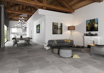 Obývací pokoj s dlažbou v imitaci betonu Le Cave