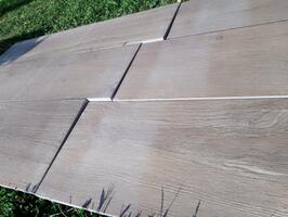 2 cm dlažba na terasu v imitaci dřeva Signature Dakota - hnědá, 30x120 cm, II. jakost | Více - 