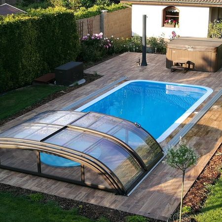 Zákazník zvolil k bazénu dlažbu v imitaci dřeva. | Inspirujte se realizacemi našich zákazníků, kteří mají na svých terasách venkovní 2cm dlažby