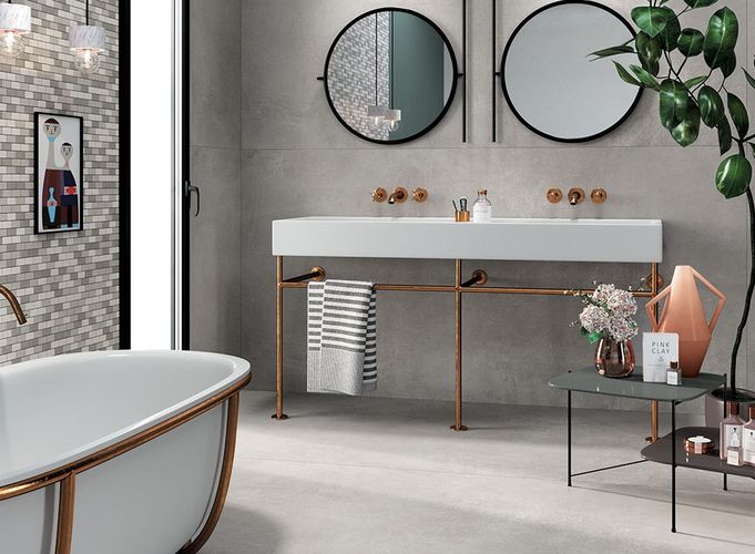Dlažbu Glocal imitující beton efektně doplňuje atypická vana, umyvadlo a koupelnové doplňky. | závěr úseku (koupelna glocal se dvěma zrcadly)