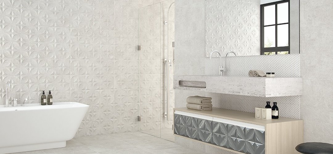 Obklad do koupelny Dixon světle šedá s dekorem imitace betonové stěrky v koupelně