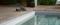 Venkovní dlažba na terasu Lake Stone T20 kolem bazénu.