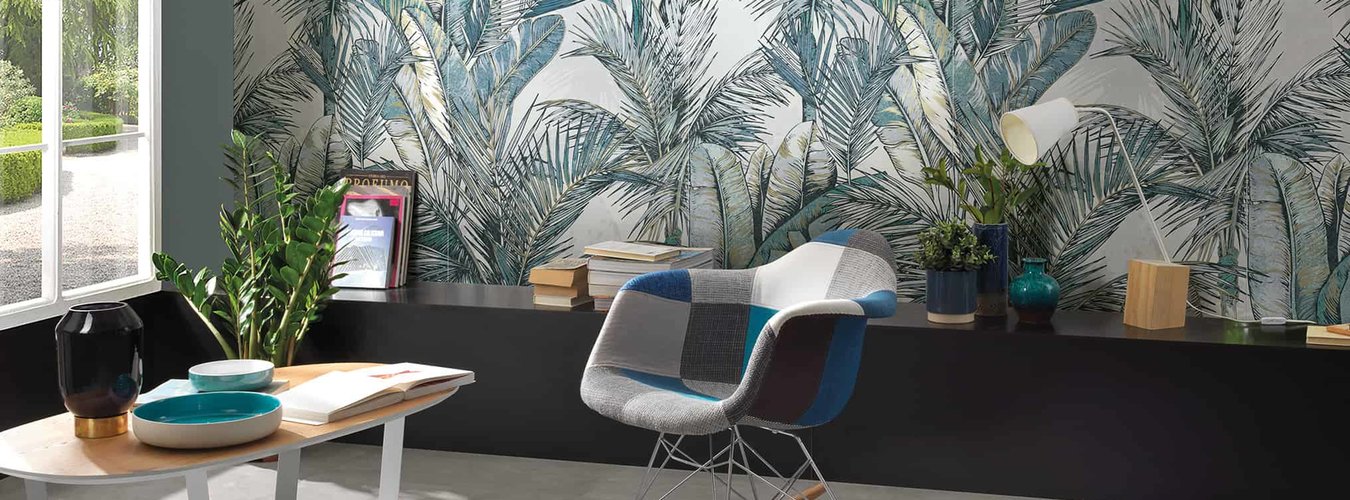 Velkoplošný dekor Deco art palmové listy Eden v obývacím pokoji